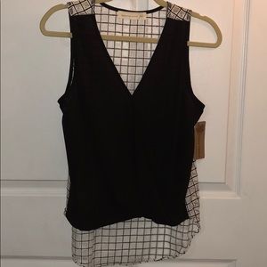 Black & White tank top with open back design